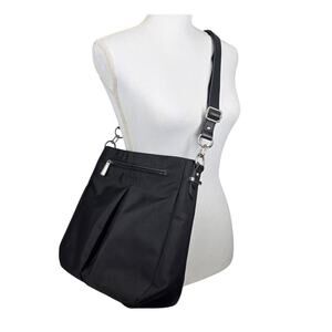 TRAVELPRO LADIES BLACK CROSSBODY HANDBAG TP108101401 ZIP POCKET ADJUSTABLE STRAP